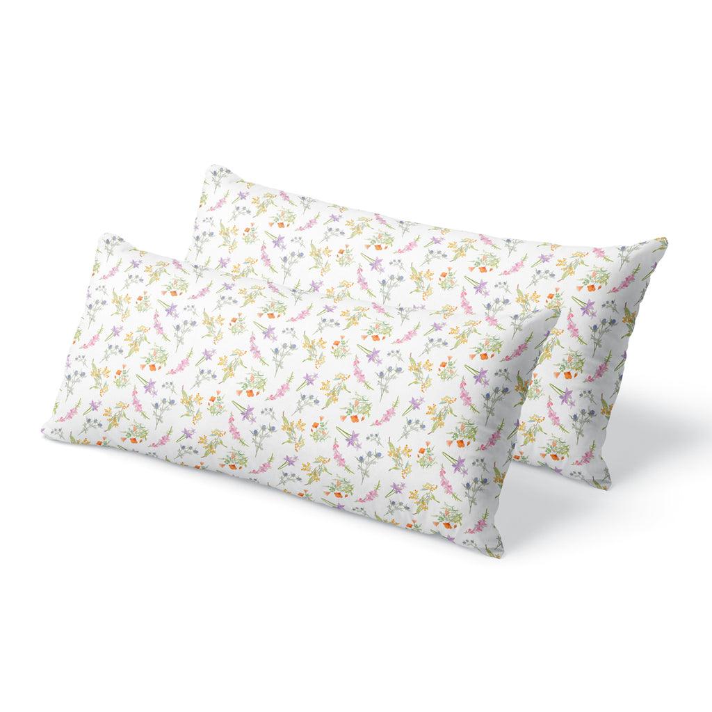 A pair of Kings size silk pillowcases with a floral design