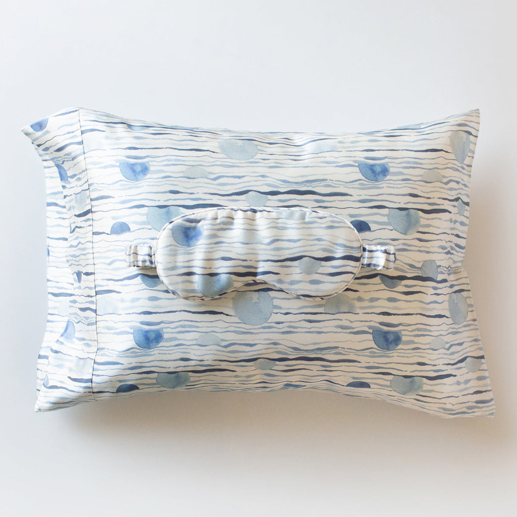 100% mulberry silk sleep mask and travel size pillowcase set in four distinct unique prints. 